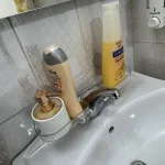 نظم‌دهنده‌ی پشت شیر روشویی